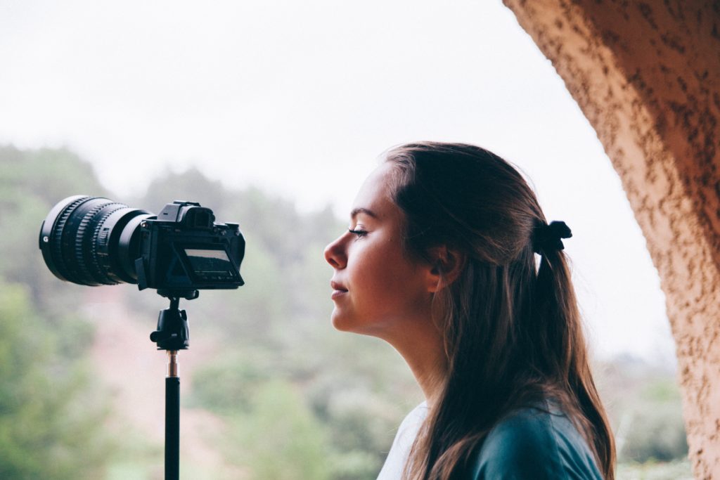 photo of person with video camera